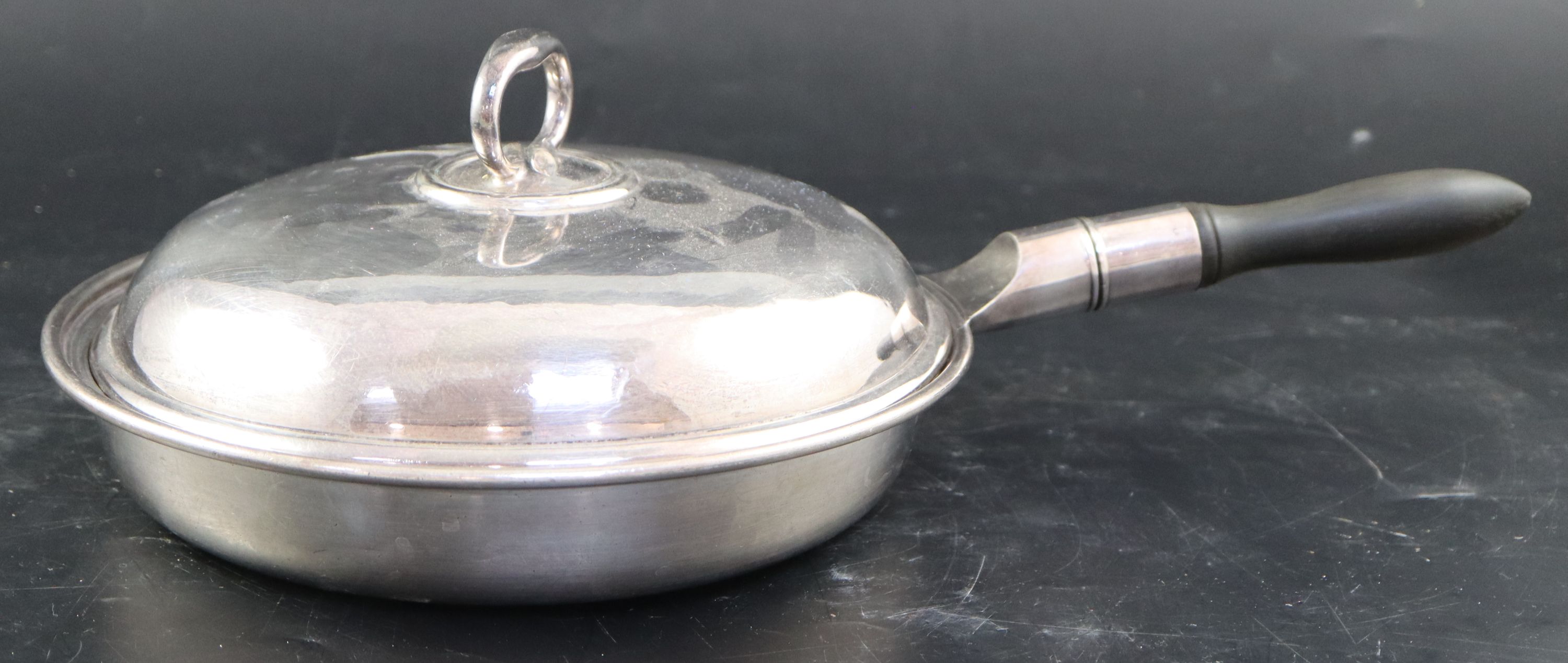 An Elkington & Co circular three division plated vegetable dish and cover, diameter 25.5cm
